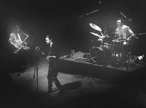 Tres músicos en un escenario (foto:Robert Freeman)