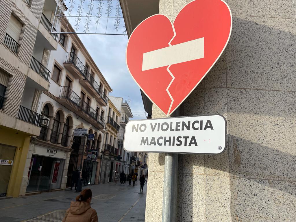 Placa contra la violencia de género.